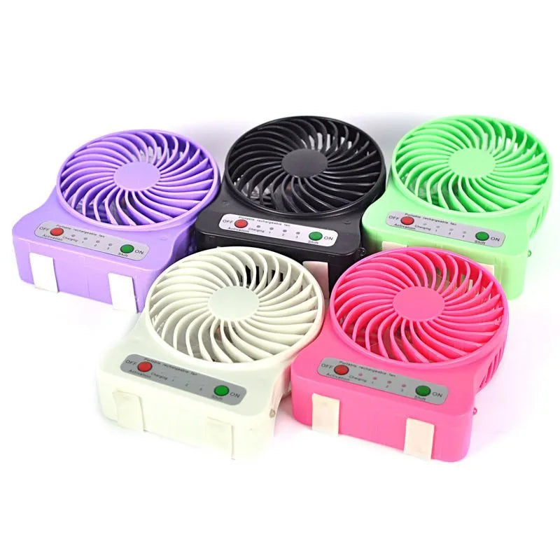 Portable Multi-Function Rechargeable Table Fan with LED Light, Powerful Airflow, Compact Design, and Multi-Color Body for Home and Office Use.
