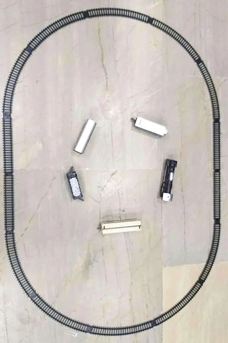 “Classic model train set with engine, 18 track pieces, light and sound features.”